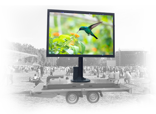 Image d'un écran géant posé sur un plateau mobile